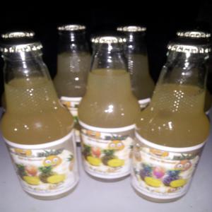 Jus d'ananas du Bénin - boissons non alcolisée pur jus d'ananas de 250 ml bio,  sans ajout de sucre ni de conservateur,  ni de colorant. il est donc idéal pour accompagner vos repas ou étancher votre soif.