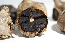 Organic Black garlic - fruits and vegetables organic black garlic--health benefit-----black garlic is obtained from fresh garlic (allium sativum l.) that has been fermented for a--period of time at a controlled high temperature (60e90c) under controlled high humidity--(80e90%). when compared with fresh garlic,  black garlic does not release a 